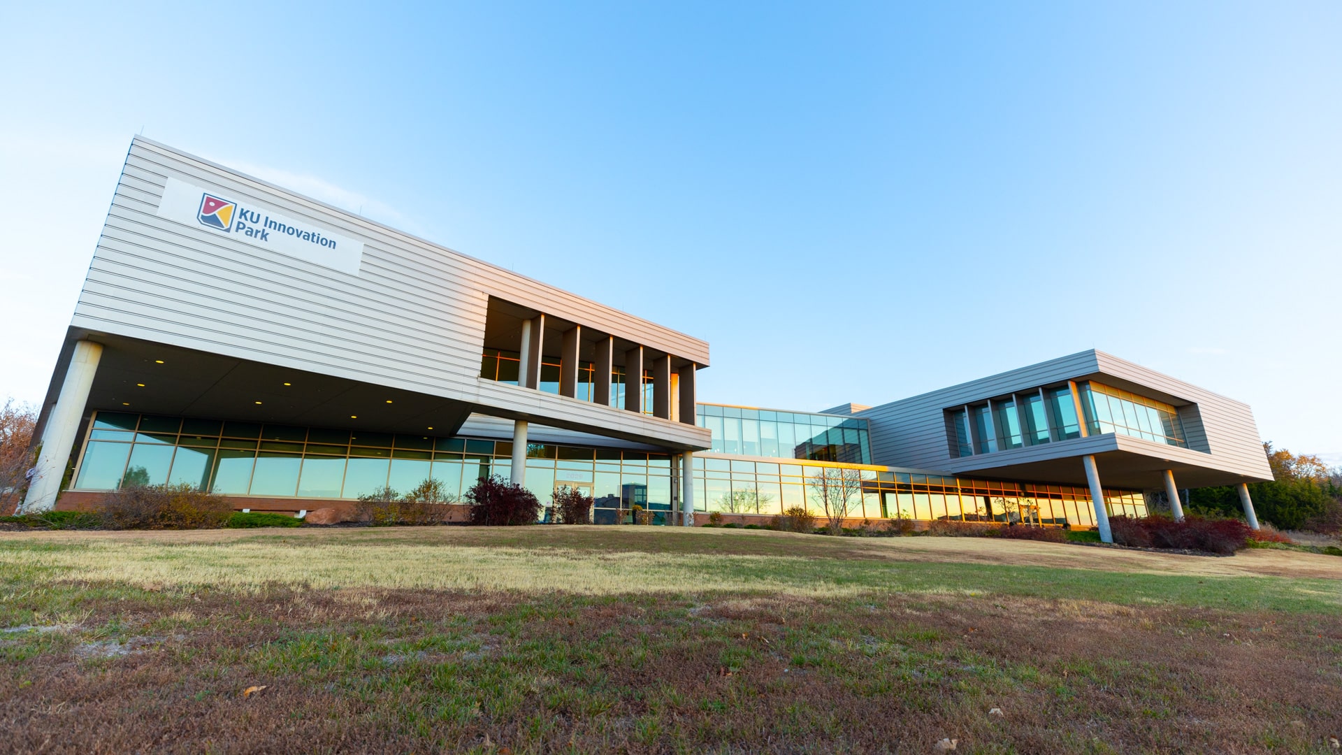 KU Innovation Center-Site Photos-2101 A portrait of the KU Innovation Park building from the grass.