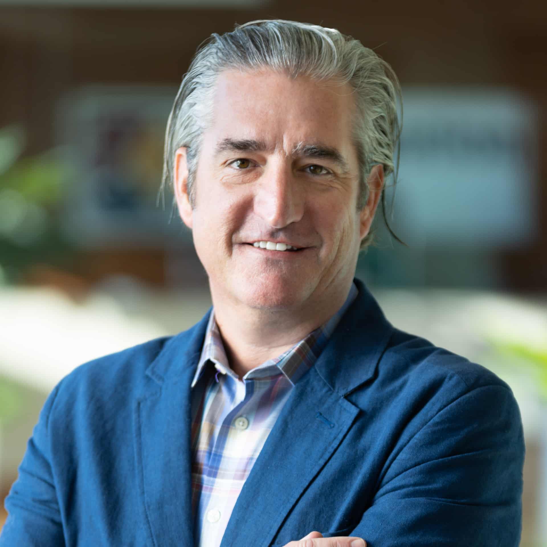 KU Innovation-Headshot-Adam Courtney A portrait of Adam Courtney smiling