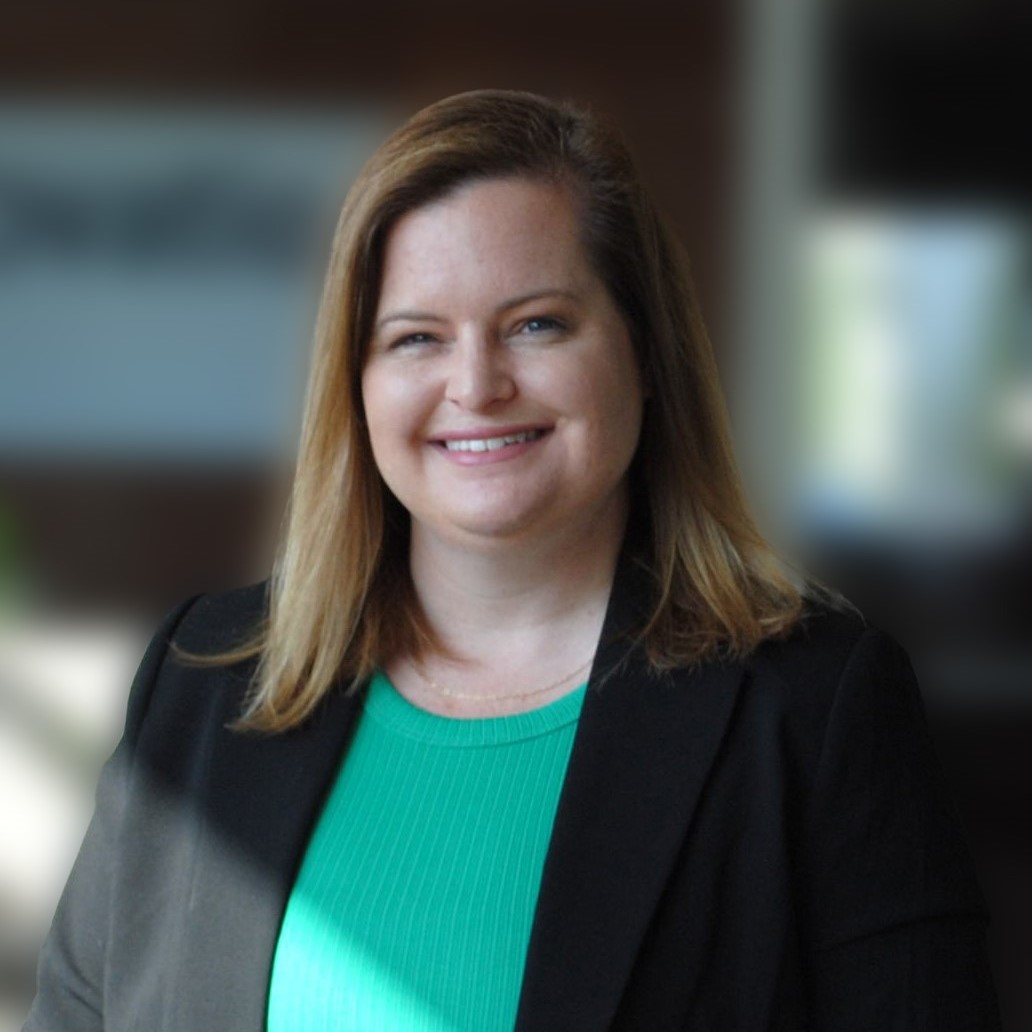 Lindsey-Website-2 A portrait of Adam Courtney smiling